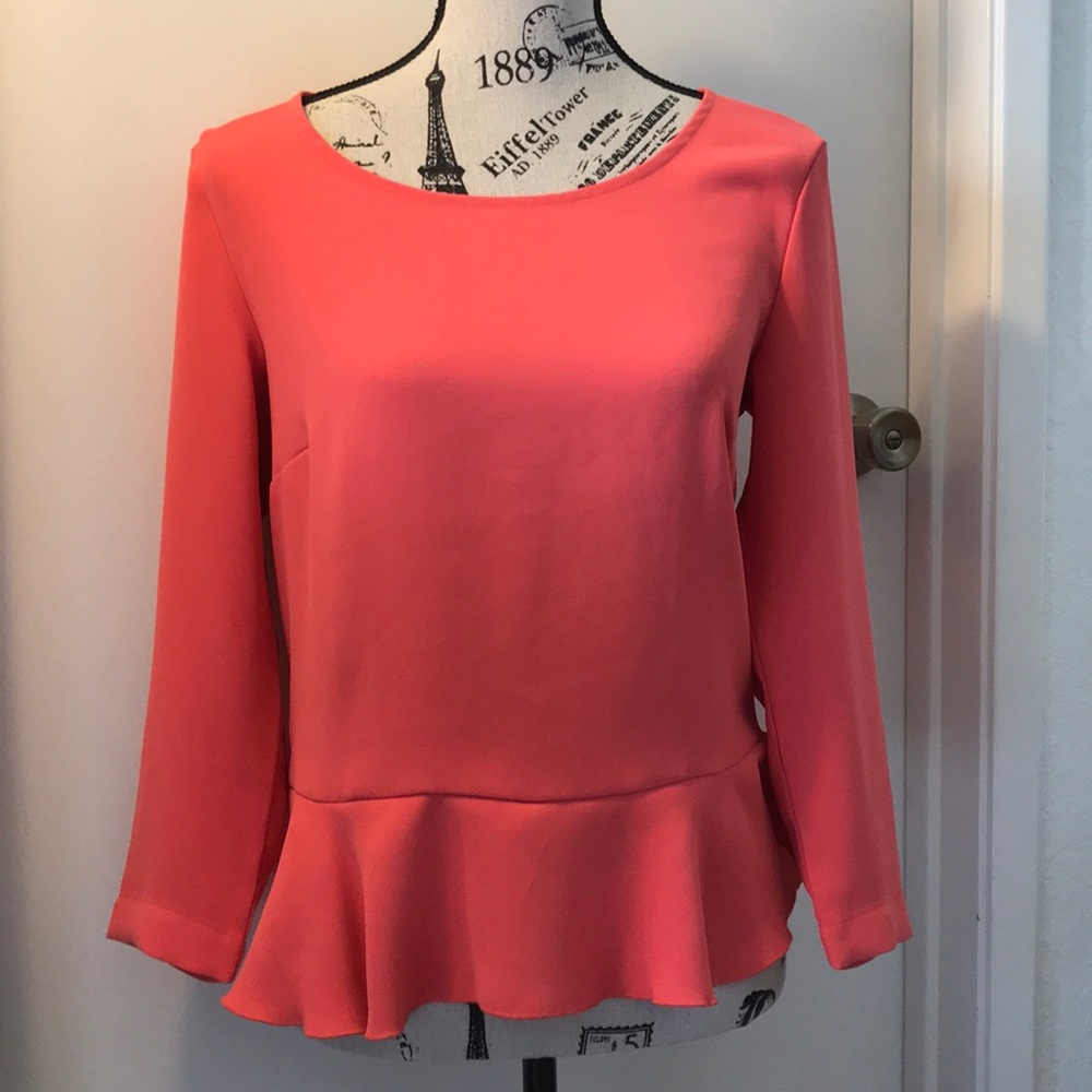 Pink peplum top